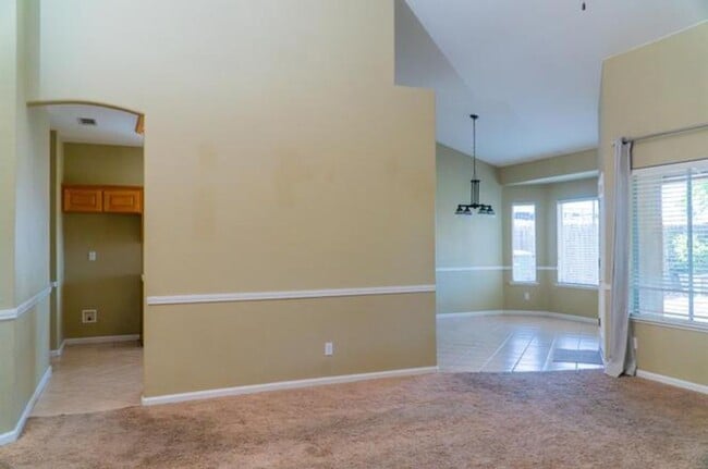 Photo - Bright & Spacious 4?BR Fresno Home with High Ceilings & Solar!