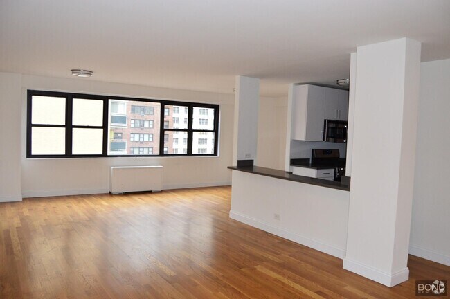 Building Photo - 145 E 16th St Unit 4E Rental