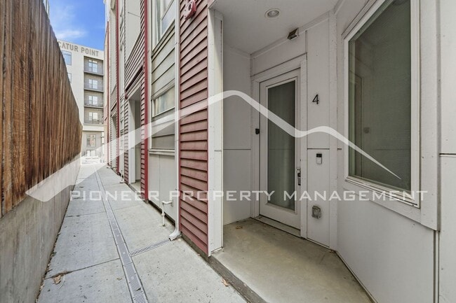 Building Photo - Stunning Townhome with Central AC and 2-Car Garage