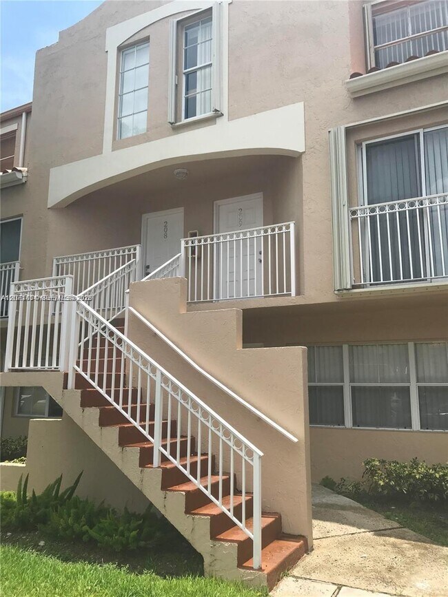 Building Photo - 8670 NW 6th Ln Unit 4-208