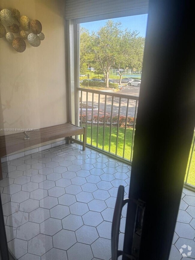 Building Photo - 16251 Golf Club Rd Unit 204 Rental