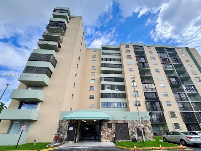 Building Photo - 5055 NW 7th St Unit 303