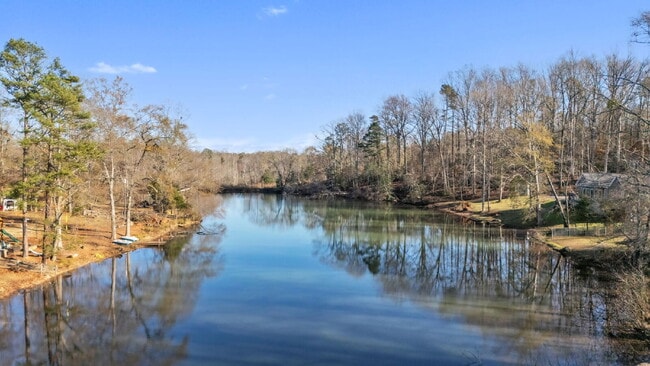 Photo - Spacious 4-Bed, 4-Bath Rental Home with Lake Views in Belle Terre Acres