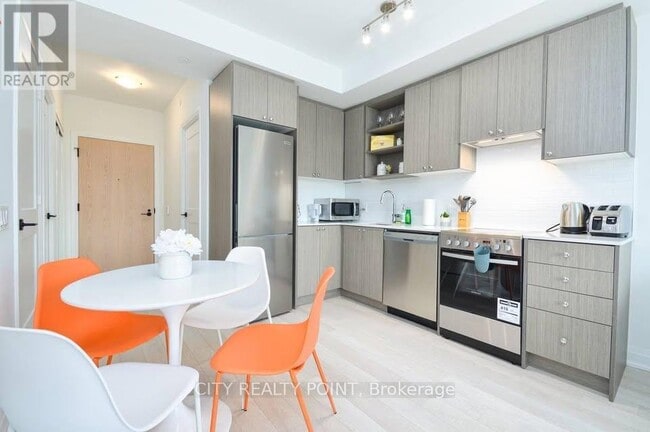 Photo - 50 George Butchart Dr Unit 211