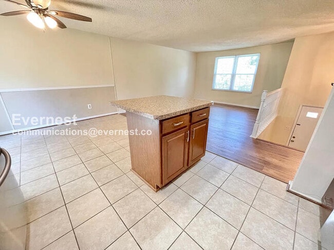 Photo - 3 Bed, 2.5 Bath Home with Fenced Yard & Garage / Pet-Friendly / Available Now!