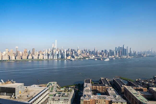 Building Photo - 6040 JFK Blvd E Unit PH 34C