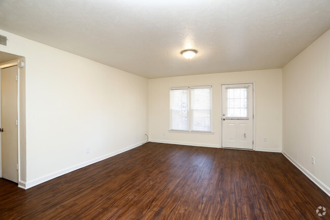 3BR, 1.5BA - 1050sf- Living Area - The Residences at Tallywood Apartments