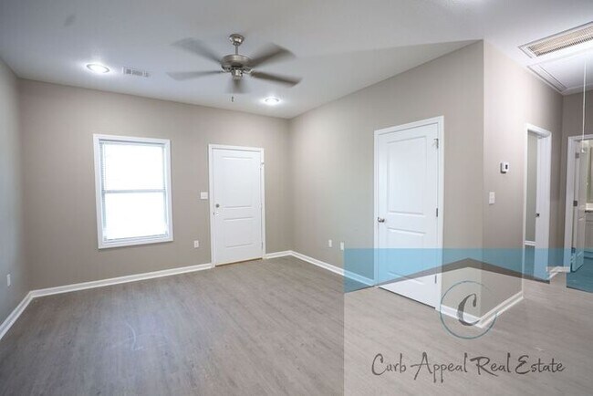 Photo - Luxury 2 bed 1 bath apartment - brand new construction!! Washer, dryer and utilities included!!