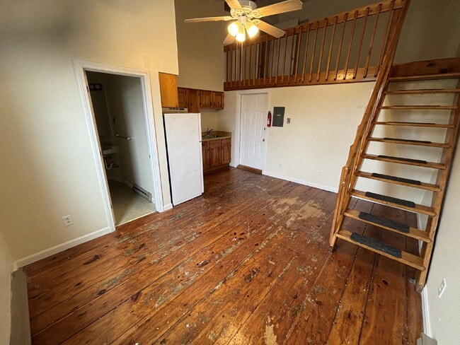 Charming Studio Loft Living with High Ceilings & Classic Hardwood Floors!