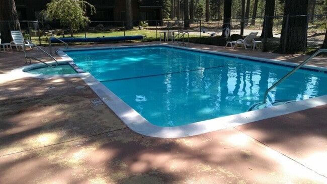 Photo - 2 bedroom condo with carport, pool and hot tub access