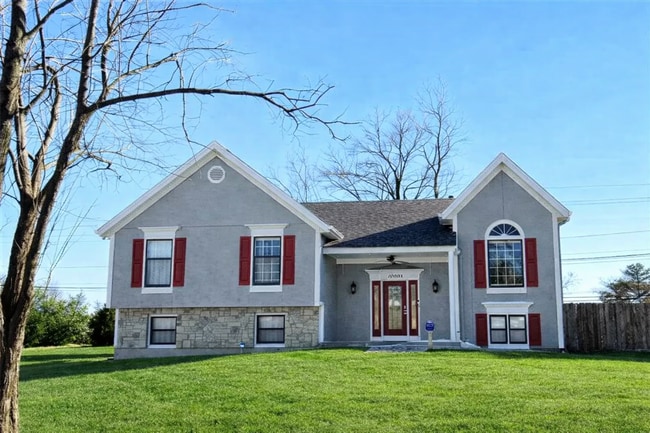 Building Photo - 4 Bed Lenexa Home w/ Finished Basement, Solar, 3 Car Garage and Fenced Yard!!