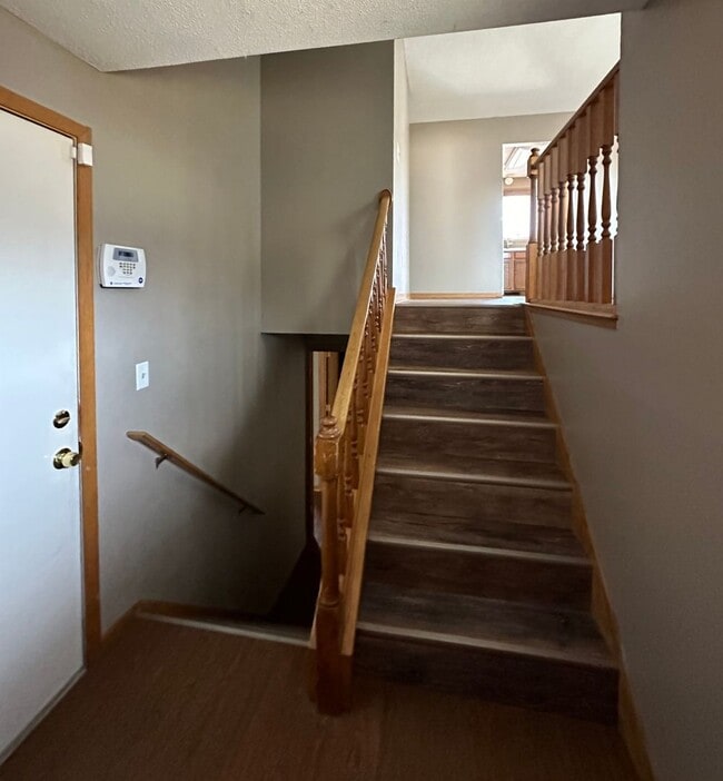 Photo - NE House for Rent 4 bedroom 2 full bathroom fenced in yard 2 Car attached garage.