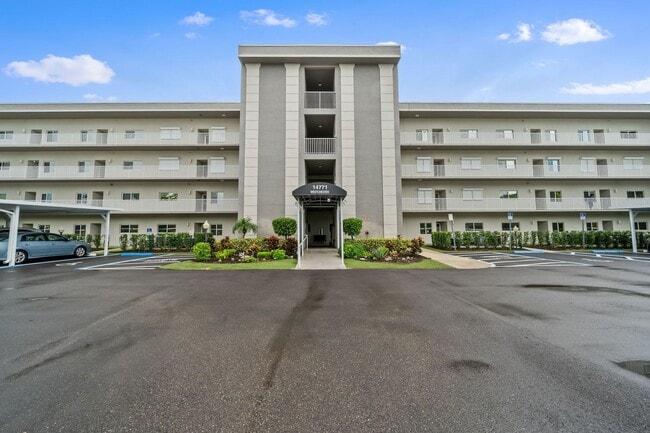 Building Photo - first-floor unit featuring a 2 bedroom, 2 ... Rental