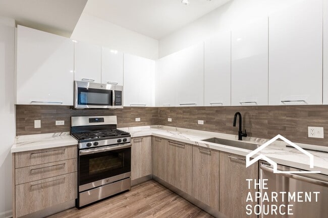 Photo - Spacious South Loop 2Bed/2Bath feat. Updated Kitchen & Large Patio! Unit 203