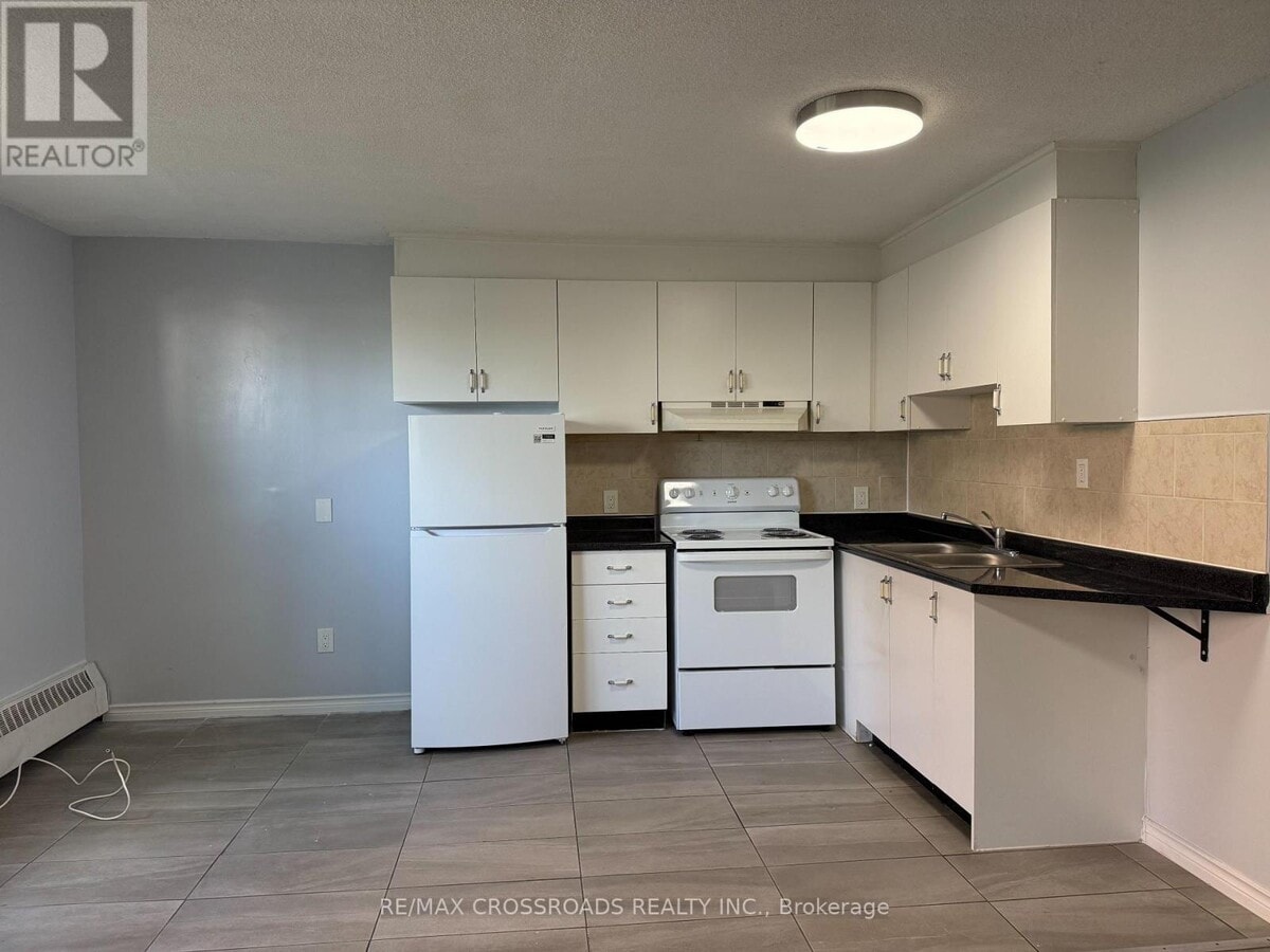 Photo - 1181 Ellesmere Rd Unité 100