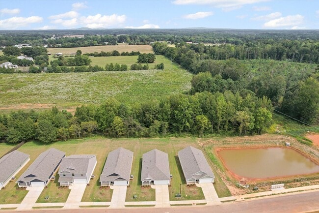 Photo - New 3BR Home in Whispering Woods – East At...
