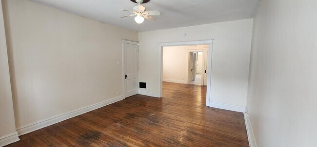 Photo - First-Floor Unit with Hardwood Floors & Spacious Living Areas