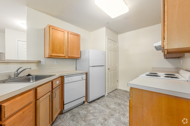 2BR, 2BA - 933SF - Kitchen - River Point Senior Apartments