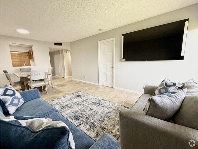 Building Photo - 8550 N Sherman Cir Unit 507 Rental