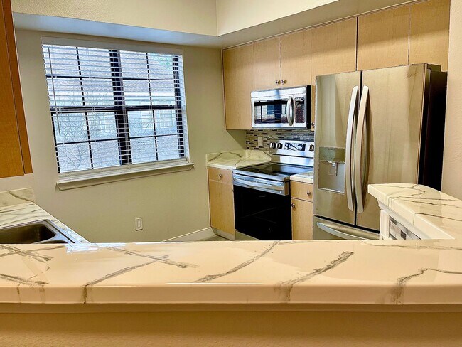 Photo - Come see this modern, elegant condo in Celebration! Unidad 206