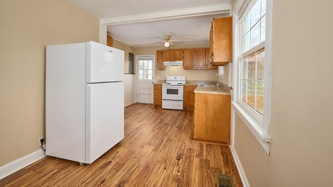 Photo - Special: 2BR, 1BA duplex $300 off for a lease starting 3/1/26 or sooner. (Do not apply without sp... Unit A