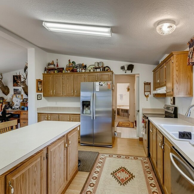 Photo - 9040 W 64th Pl