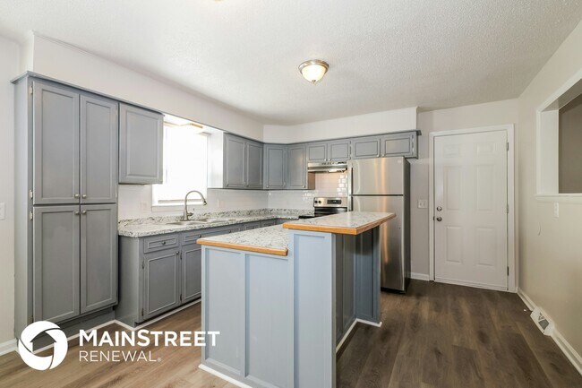 Photo - 403 E 9th St