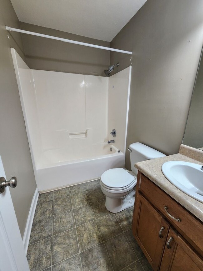 Photo - Charming 3BR/2BA Home with Open Floor Plan, Vaulted Ceilings & 2-Car Garage