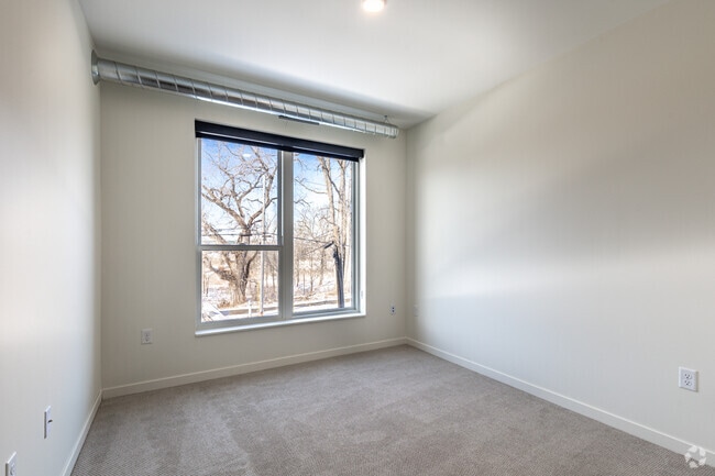 3BR, 2BA - 1,170SF - Primary Bedroom