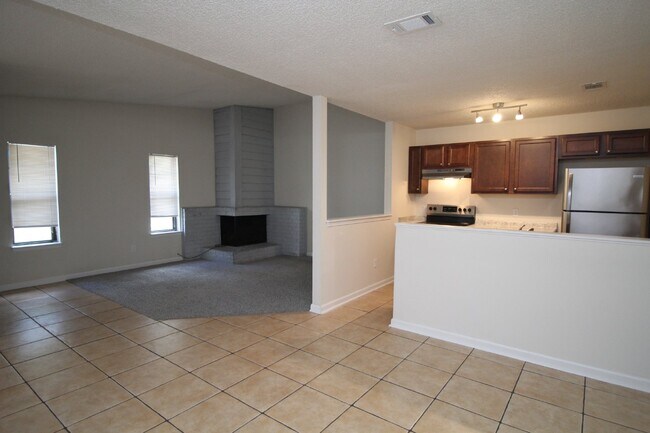 Photo - Modern 3BR/2BA Duplex with Open Layout, Fireplace, Fenced Backyard & Updated Kitchen in North Pen...