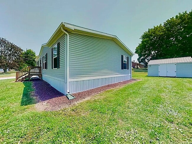 Photo - Fabulous ranch home on 1/2 acre.