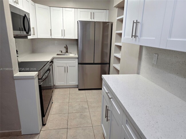 Building Photo - 8701 SW 141st St Unit B2