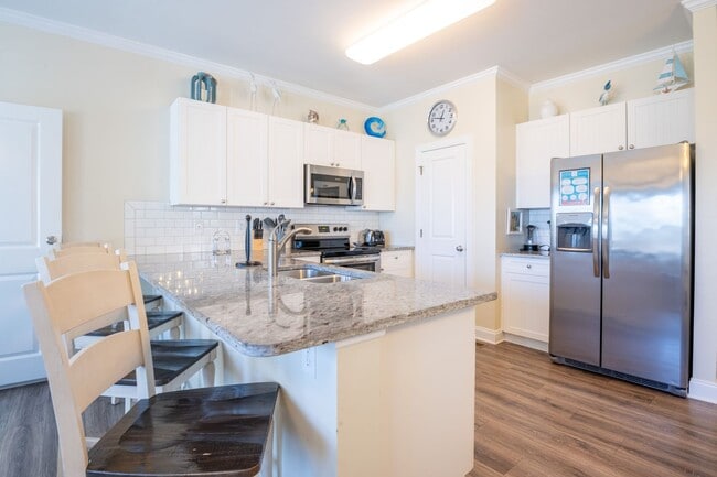 Photo - PRICE REDUCTION! LIVE AT THE BEACH FOR THE...