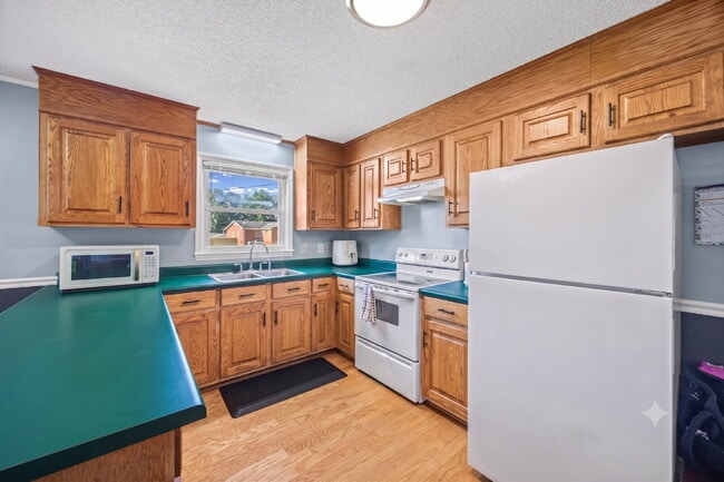 Photo - Charming All-Brick 3BR Home with Carport & Easy Charlotte Commute!