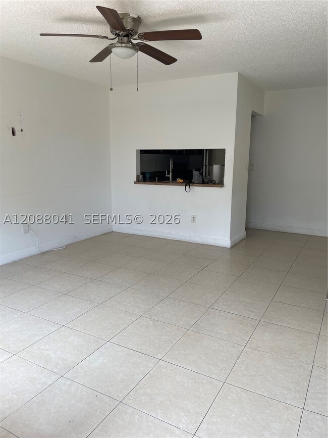 Building Photo - 15318 SW 72nd St Unit 15-21