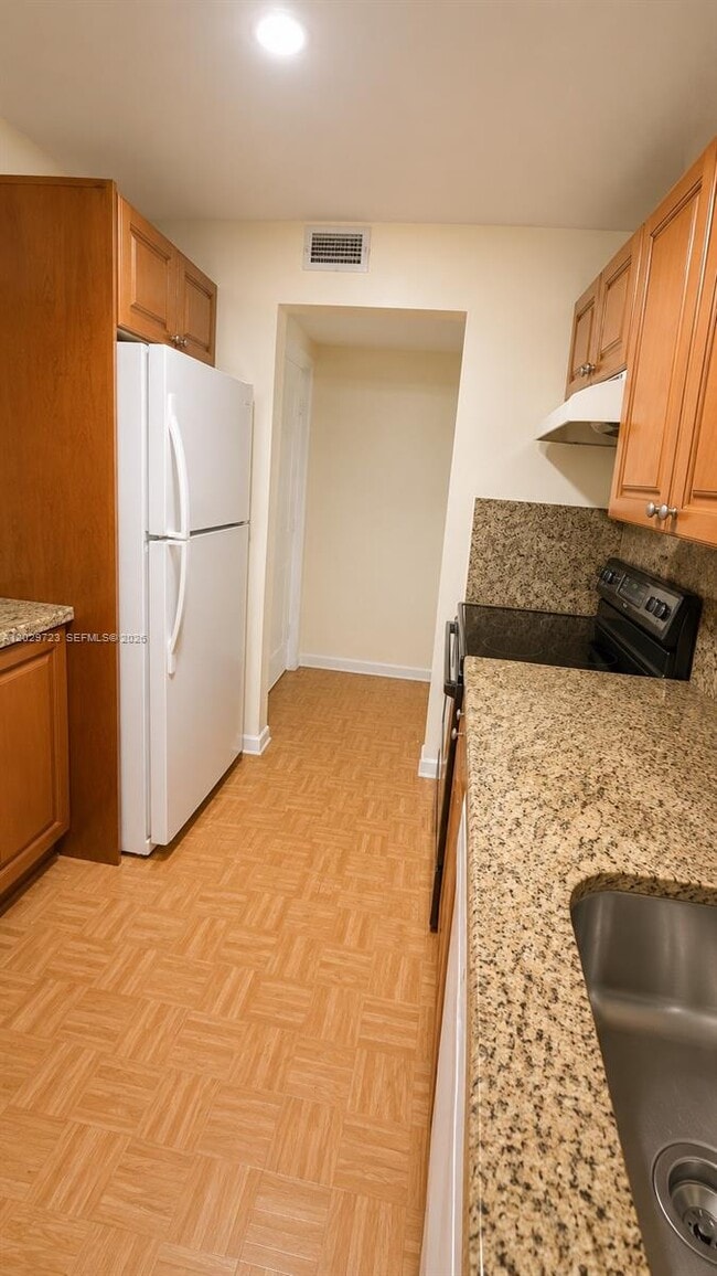 Building Photo - 8520 SW 133rd Avenue Rd Unit 210