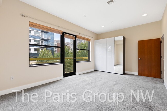 Exceptional 2 Story CapHill Condo * 2 Pkg Spaces, EV Charger & Rooftop Views