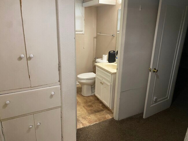 Hall, storage, and bathroom - 512 Grand Ave