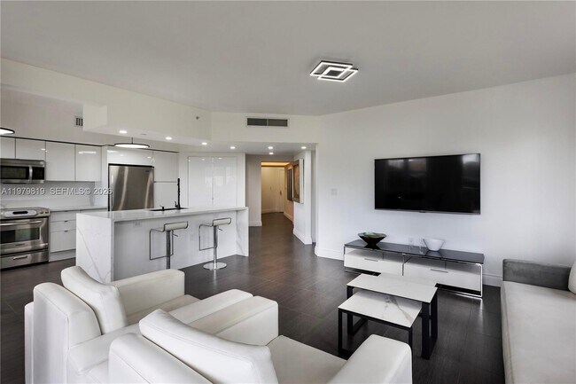 Building Photo - 19900 E Country Club Dr Unit 311