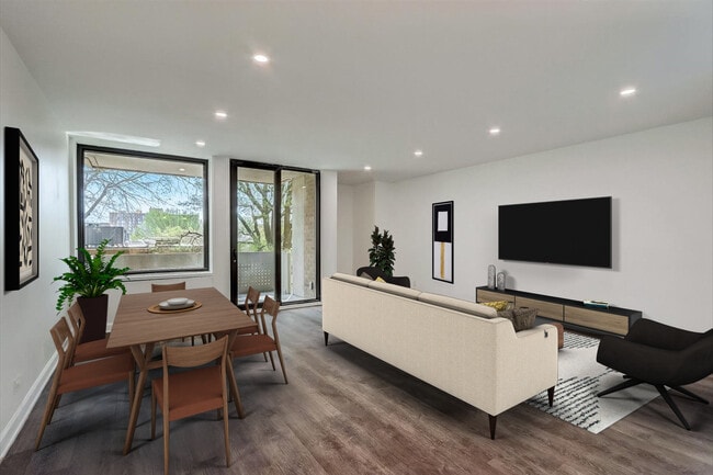 Large living area has space for living and full dining table. - 240 M St SW Unit E100