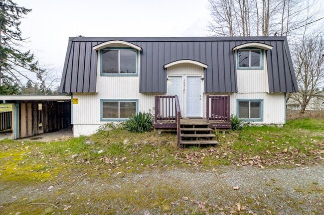 Building Photo - 13314 86 Ave E Unit A