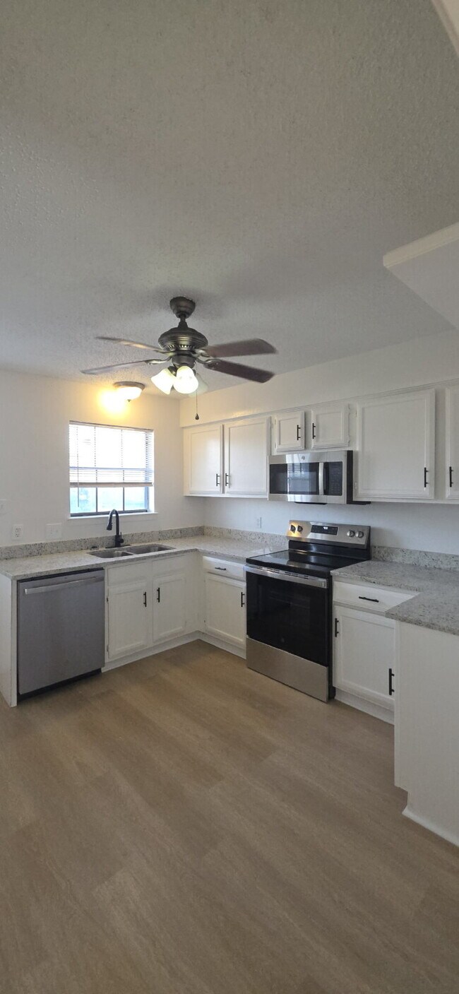 Photo - First-floor condo with fenced in backyard!