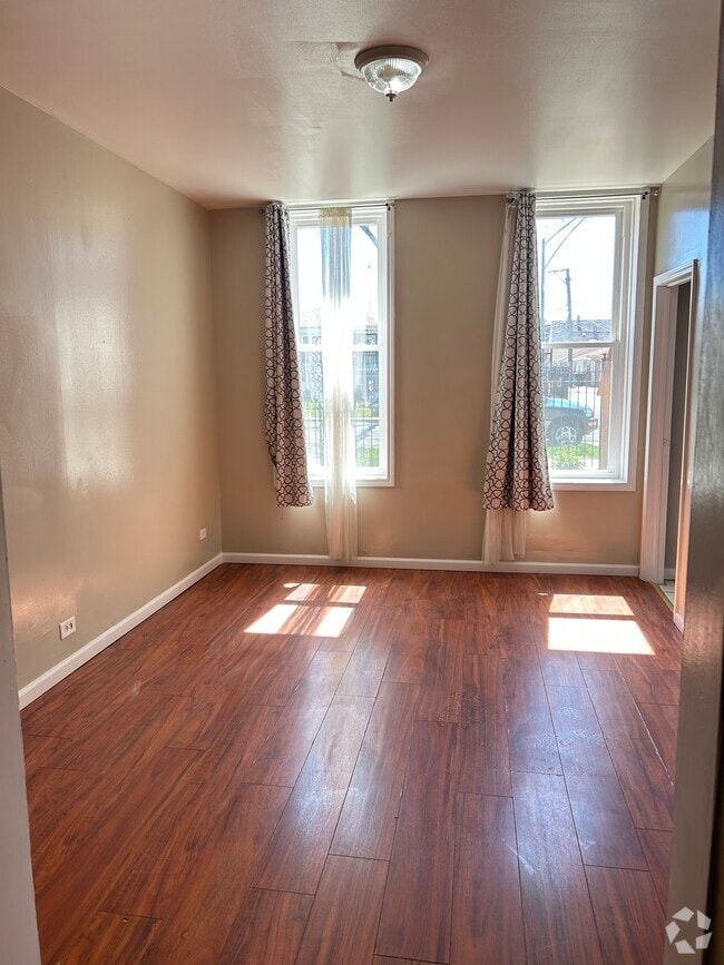 Building Photo - 3242 W 38th Pl Unit 1F Rental