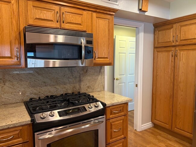 Gas stove, and microwave - 2954 Baker St