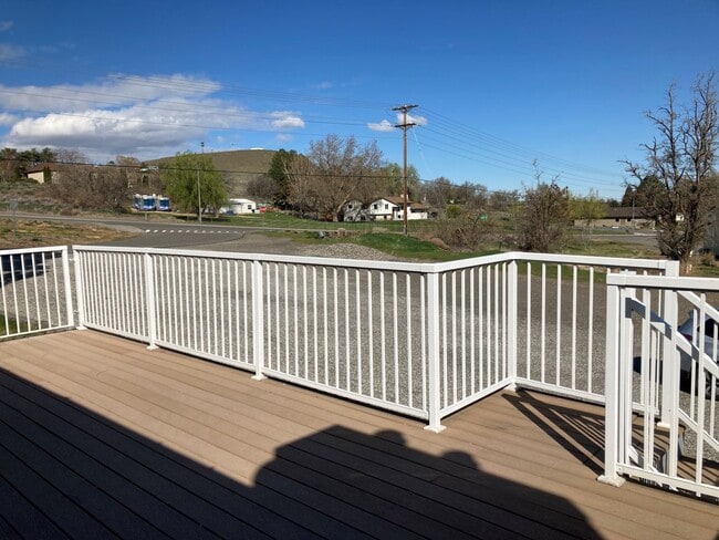 Photo - Spacious 4-Bedroom, 2-Bath Home with Daylight Basement, Large Yard & Two Fireplaces!.