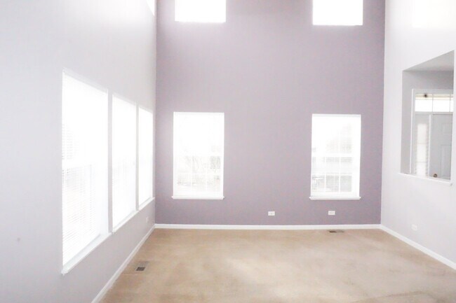 Photo - Rare find-3 Bedroom spacious corner unit with Den, 2.5 baths and 2 car garage