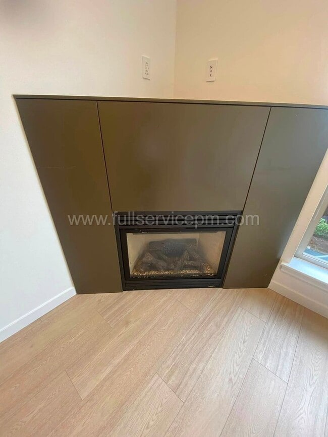 Photo - Modern Queen Anne Townhome w/ Dedicated Office, Fenced Patio, Lofted Primary Suite & Oversized Ga...
