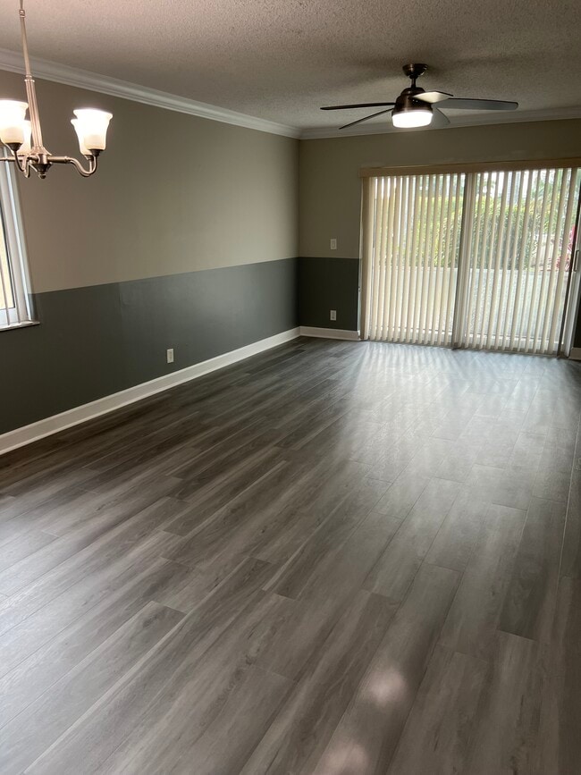 New flooring in living room - 6184 Michelle Way Unit MartiniqeCondos