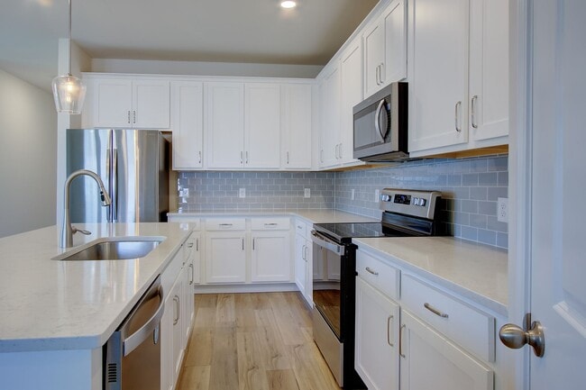 Photo - Spacious 4BR Rental with Stunning Kitchen & Covered Patio