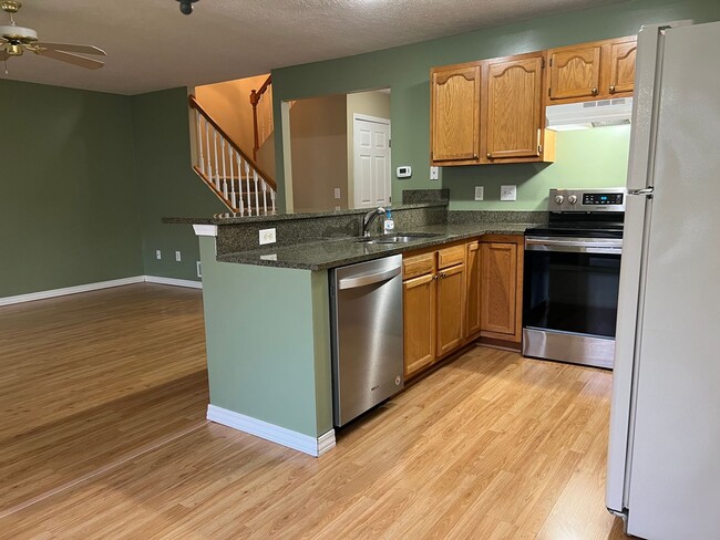 Photo - Very sharp 3 BR, 2.5 bathroom, updated appliances, hardwood flooring